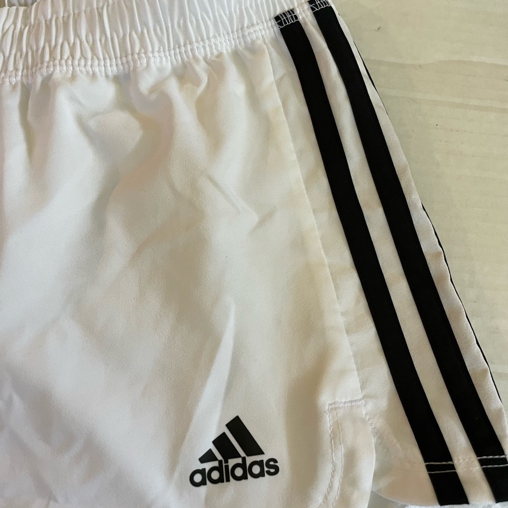Adidas White dri-fit shorts w/3 black stripes on sides Size Medium